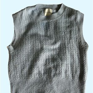 baby blue sweater vest 🌨️